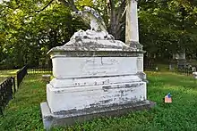 Marble sarcophagus sculpture with an eagle on top