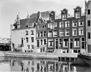 Facades on the Achtergracht at the corner of the Amstel (1955)