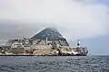 View of Europa Point and the Rock of Gibraltar from the Strait of Gibraltar. Levante Cloud overhead.