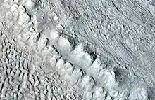 Enlargement of the area in the rectangle in the previous image. This area would be called a moraine in an alpine glacier on Earth.