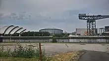 View over the River Clyde of Glasgow's Finnieston Crane, OVO Hydro and the Armadillo.