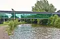 Glass footbridge over the canal at the World of Glass.