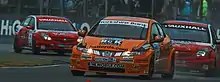 Shedden's Civic leads two of the VX Racing Vauxhalls at the Croft round of the 2008 British Touring Car Championship season