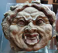 Gorgon antefix, Orvieto, end 5th century.  Heads of both Silenus and gorgons were common subjects for antefixes.