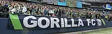 Banner in front of the crowd read "Gorilla FC".