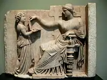 Image 31Gravestone of a woman with her slave child-attendant, c. 100 BC (from Ancient Greece)