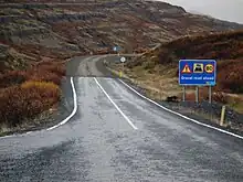 Image 42Pavement ends and turns into gravel surface road (from Road surface)