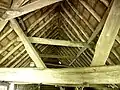 Roof beams inside thatched barn