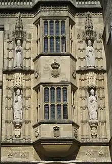 Oriel windows with statues