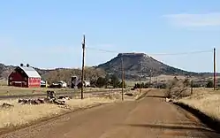 East Noe Road in Greenland, with Larkspur Butte in the distance.