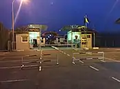 The pedesrian border crossing between Veľké_Slemence, Slovakia and Mali Selmentsi, Ukraine as seen from Ukrainian side of the border, June 2017, night time.