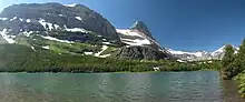 Redrock Lake with Mount Grinnell above Redrock Falls with Grinnell Point to the left.