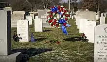 Grissom and Chaffee headstones with a wreath between them