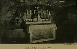 1913 postcard showing the altar inside the grotto of Elijah