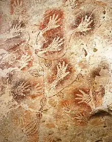 Image 47Hand stencils in the "Tree of Life" cave painting in Gua Tewet, Kalimantan, Indonesia (from History of painting)