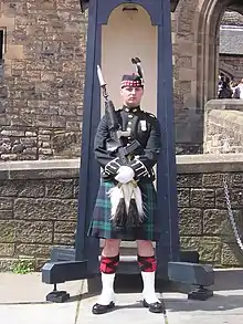 A private of the Royal Regiment of Scotland wearing the Scottish version of No.1 dress.