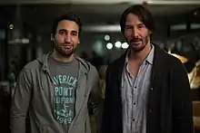 Guillermo Amoedo and Reeves on the set of Knock Knock, 2014