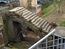 vestige of 1826 canal bridge from Lillie Bridge, Fulham