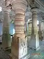 Intricate carvinged pillars inside temple