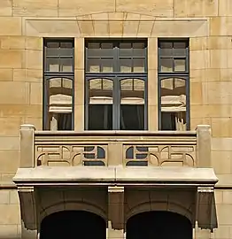 The balcony with the stone parapet