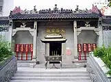 Image 27A Mazu temple in Shek Pai Wan; It clearly shows traits of classical Lingnan style - pale colour, rectangular structures, use of reliefs, among others. (from Culture of Hong Kong)