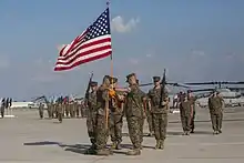 Casing of the Colors during the HMLA-467 deactivation ceremony.