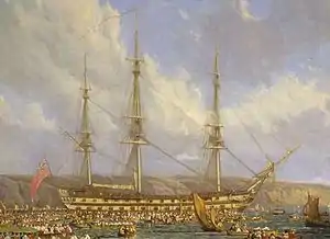 Oil painting of a three-masted sailing ship seen from side against a background of cliffs, with many small boats filled with people in the foreground