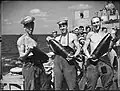 Crew of HMS Euryalus with shells, August 1942