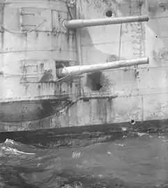 Casemate guns on HMS Kent showing shell damage from the Battle of the Falkland Islands