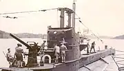 The S-class British submarine HMS Sibyl in harbour at Trincomalee, Ceylon.