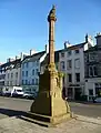 The cross at Haddington, East Lothian, topped by the town's symbol, a goat