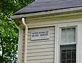 Plaque on the front of the house