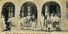 Image 26Staff of the German legation and the Hamburg-Amerika Line agency at Port-au-Prince, Haiti in 1900. The agency was involved in the staffing and management of the legation. German nationals were comparatively numerous in Haiti and heavily involved in the Haitian economy until World War I. (from History of Haiti)