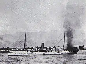 Crête-à-Pierrot with a large cloud of black smoke rising from the rear of the vessel