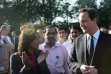 Woman talking to prime minister