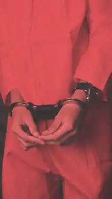 Handcuffed to the front