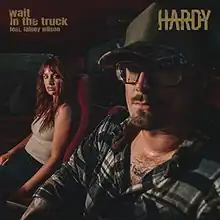 Cover art depicting Hardy and Lainey Wilson sitting in a truck