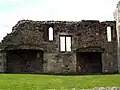 Site of abbey kitchens, with two fireplaces prominent.