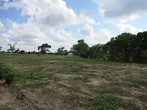 Historic site of Hawkinsville is on FM 457 about 1 mile north of FM 2611. Caney Creek is on the right.