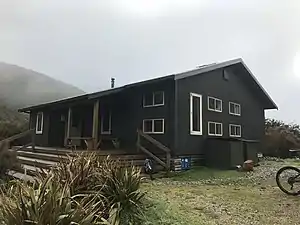 Perry Saddle Hut is near the highest point of the track