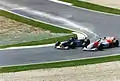 Frentzen's Sauber C15 overtaking Hakkinen's McLaren at Imola in 1996