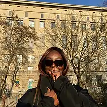 Henrietta Smith-Rolla (Afrodeutsche) standing outside Berghain, Berlin