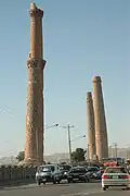 Traffic passing on the road near the Herat minarets, 2005.