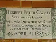 A tablet formed of six standard sized tiles, bordered by green flowers in the style of the Arts and Crafts movement