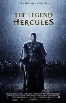 A man standing in the rain with an army of soldiers in the background