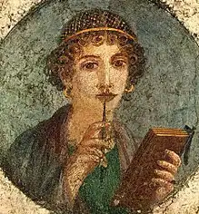 Image 30Woman holding wax tablets in the form of the codex. Wall painting from Pompeii, before 79 CE. (from History of books)