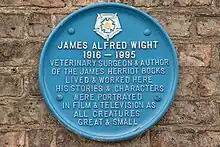 Blue plaque at the World of James Herriot