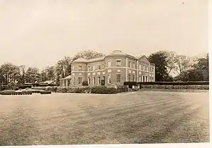 Herstmonceux Place, circa 1932. The south and east fronts by Samuel Wyatt in 1778. The white panels are Coade Stone.(See "Herstmonceux Place")