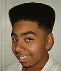 Image 123African-American teenager with Hitop fade, popular in the early 1990s. (from 1990s in fashion)