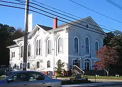 Holliston Town Hall on the east border of the town green